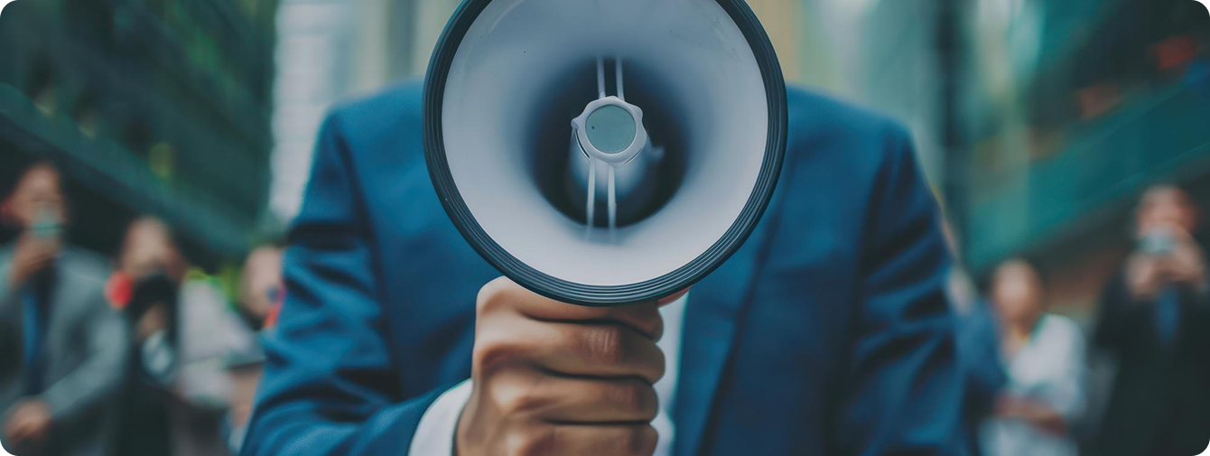Conference audience listening to a speaker
